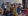 Group of event attendees dance at an outdoor event