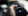Close-up of person holding a phone playing music