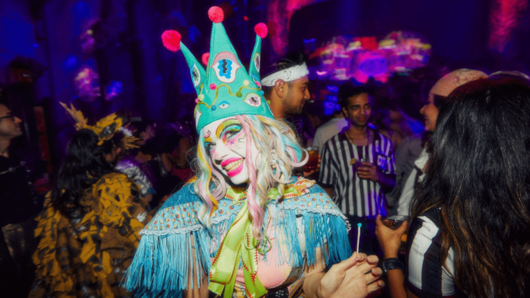 girl dressed as clown at party